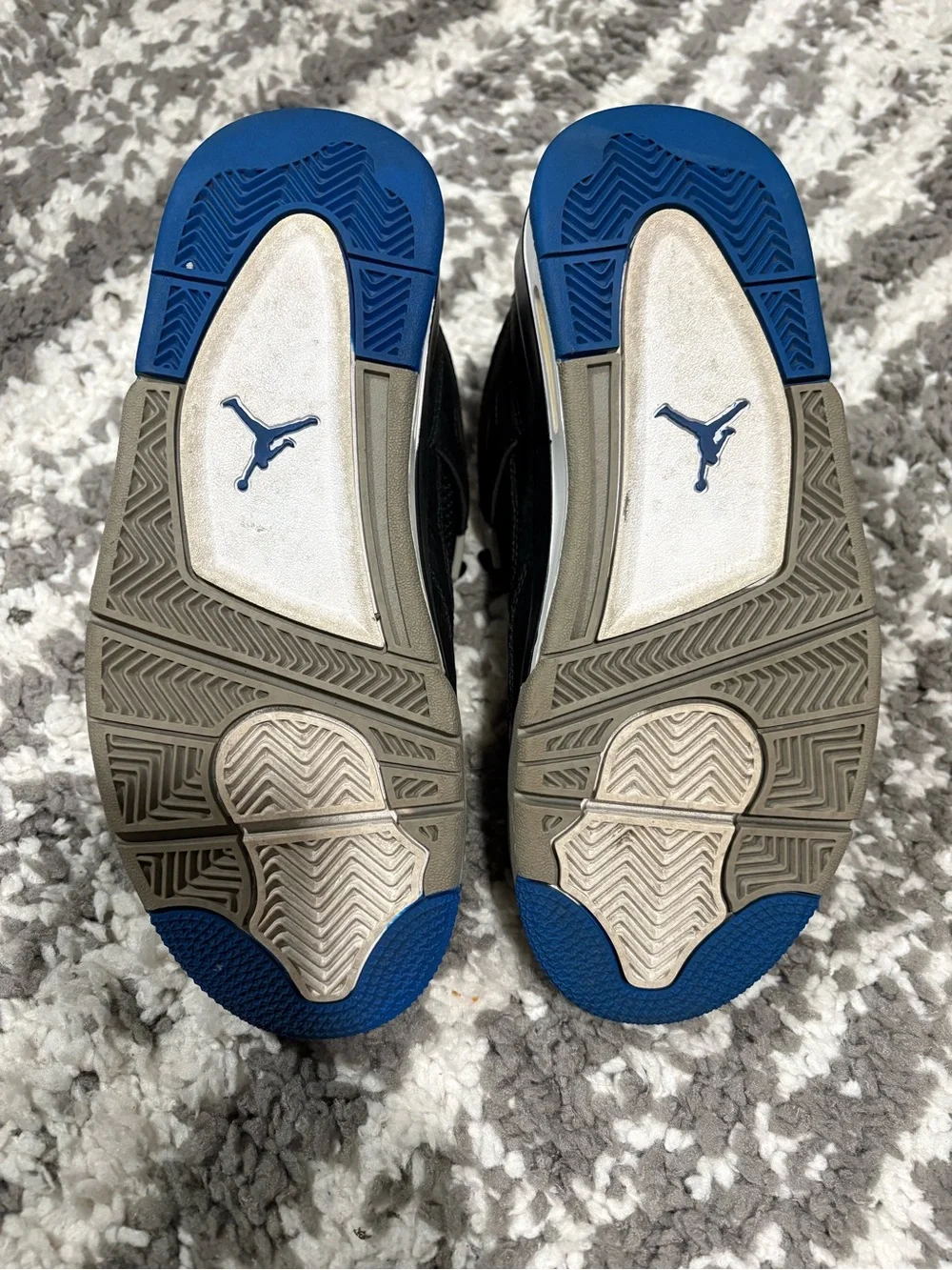 Nike Kids Black Sneakers with Blue Accents